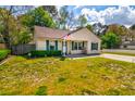 Cozy single-story home with tidy lawn and mature trees at 1257 Maryland Dr, Ladson, SC 29456