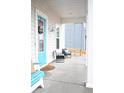Inviting front porch featuring outdoor seating, a hanging swing, and charming decor at 149 Greenbelt Ct, Summerville, SC 29485