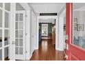 Inviting foyer with hardwood floors, French doors, and a warm, welcoming atmosphere at 2353 Eagle Creek Dr, Charleston, SC 29414