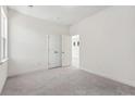 Spacious bedroom boasts plush carpeting and a double door closet for ample storage at 396 Claret Cup Way, Charleston, SC 29414