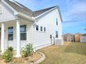 This well-maintained home features a charming landscaped yard and private backyard at 609 Sienna Way, Summerville, SC 29486