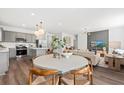 Open-concept living space with kitchen, dining area, and living room; seamless flow for modern living at 739 Meadowbrook Ln, Summerville, SC 29486