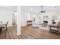 Open concept living room showcasing hardwood floors, natural light, and inviting layout at 102 Kapalua Run, Summerville, SC 29483