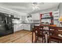 Bright kitchen with stainless steel appliances, granite countertops, and light wood floors at 132 Heather Dr, Summerville, SC 29486