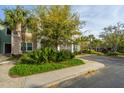 Multi-Gathering building featuring mature landscaping, green and beige siding, and ample parking at 1755 Central Park Rd # 3102, Charleston, SC 29412