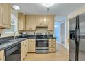 Functional kitchen with stainless steel appliances and wood flooring at 1932 Sunnyvale Ave, Charleston, SC 29414