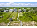 Beachfront community homes with boardwalk access and lush landscaping at 2906 Palm Blvd, Isle of Palms, SC 29451