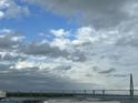 View of a long bridge with gray clouds filling the sky at 330 Concord St # 9C, Charleston, SC 29401
