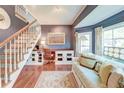 Bright home office with built-in desk, storage, hardwood floors and natural light at 633 Schooner Rd, Charleston, SC 29412
