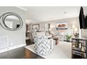 Bright living room featuring stylish furniture, decor, and ample space for relaxation and entertaining at 10 Logan St # 6, Charleston, SC 29401
