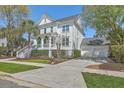 Beautiful two-story house with a two car garage and wide driveway offering ample parking at 1115 Barfield St, Charleston, SC 29492