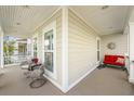 Relaxing front porch with seating, perfect for enjoying the outdoors at 3443 Yarmouth Dr, Mount Pleasant, SC 29466