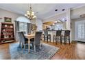 Well-lit dining area boasts a stylish chandelier and offers an inviting space to enjoy meals with loved ones at 462 Mount Royall Dr, Mount Pleasant, SC 29464