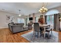Open-concept living space with fireplace, seamlessly connecting the dining area for easy entertaining at 462 Mount Royall Dr, Mount Pleasant, SC 29464