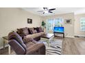 Comfortable living room features stylish decor and lots of natural light at 601 Buckthorn Cir, Summerville, SC 29483