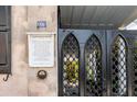 Close-up of the Jacob Motte House plaque by the elaborate metal gate at 61  at 61 Tradd St, Charleston, SC 29401