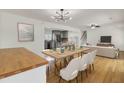 Dining area offering a view of the modern kitchen and open living space at 703 Canary Dr, Charleston, SC 29414