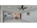 Bright kitchen area featuring modern light gray cabinets, stainless steel appliances, and recessed lighting at 746 Cartwright Dr, Charleston, SC 29414