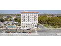 Beautiful architecture features a swimming pool, parking, and scenic waterfront views at 1 King St # 209/210, Charleston, SC 29401