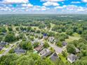 Stunning aerial view of a lush neighborhood, showcasing the home's prime location at 105 N Gateshead Xing Xing, Goose Creek, SC 29445