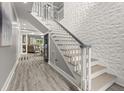 Elegant staircase with modern paneled walls, leading to the upper level of the home at 105 N Gateshead Xing Xing, Goose Creek, SC 29445