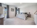 Spacious bedroom with carpet, a comfortable bed, and a crib at 1132 Mossy Rock Dr, Summerville, SC 29485