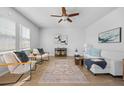 Bright and airy living room with hardwood floors, contemporary decor, and ample natural light at 1309 Berry Grove Dr, Summerville, SC 29485