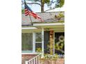 Close-up of front door with visible house number and festive wreath at 392 Cross St, Charleston, SC 29407