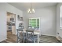 Stylish dining area with modern furniture, perfect for entertaining and Gathering meals at 637 Hilchot Dr, Summerville, SC 29486