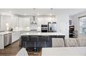 Bright, eat-in kitchen features modern appliances, a spacious island, and stylish seating at 861 Recess Point Dr, Moncks Corner, SC 29461