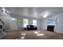 Spacious living room with fireplace and plenty of natural light at 104 Queen Mary Ct, Summerville, SC 29485