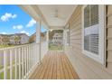 Relaxing balcony with white railings, providing neighborhood views and fresh air at 154 Old Jackson Rd, Goose Creek, SC 29445