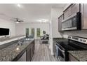 Modern kitchen featuring granite countertops, stainless steel appliances, and an open-concept design at 178 Buchanan Cir, Goose Creek, SC 29445