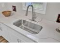 Close-up of a stainless steel kitchen sink with quartz countertops at 2916 Louise Dr, North Charleston, SC 29405