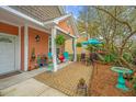 Cozy front porch with comfortable seating and charming decor, creating a welcoming outdoor space at 2952 Sweetleaf Ln, Johns Island, SC 29455