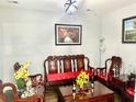 Living room features decorative chairs, a table, and art on the wall at 565 Mountain Laurel Cir, Goose Creek, SC 29445