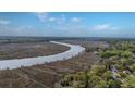 Picturesque aerial view of community, docks and a serene waterway at 7787 Montview Rd, North Charleston, SC 29418