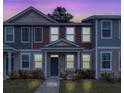 Charming townhome exterior showcasing the well-maintained facade and inviting entrance at 7787 Montview Rd, North Charleston, SC 29418