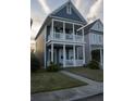 Inviting two-story home with double porches and classic architectural details at 102 Dandelion St, Summerville, SC 29483