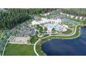 Stunning aerial view of community amenities, including pool, clubhouse, tennis courts, and lake at 1128 Darling St, Summerville, SC 29485