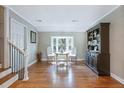 Bright living room featuring hardwood floors, large window, and stylish furniture at 1342 Dennis Blvd, Moncks Corner, SC 29461