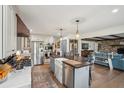 Bright, open kitchen with stainless steel appliances, farmhouse sink and breakfast bar at 630 Cain Dr, Mount Pleasant, SC 29464