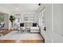 Bright living room with hardwood floors, a comfortable sectional sofa, and plenty of natural light at 85 Colleton Dr, Charleston, SC 29407