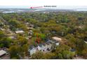 Aerial shot of a neighborhood near Sullivans Island, highlighting tree coverage and proximity to water at 975 Warrick Oaks Ln, Mount Pleasant, SC 29464