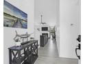 Inviting entryway showcasing modern decor, sleek flooring, and a glimpse into the bright living space at 1174 Pittsford Cir, Charleston, SC 29412