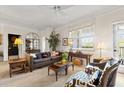 Inviting living room featuring classic furniture, abundant natural light, and refined decor at 1597 Cambridge Lakes Dr # 303E, Mount Pleasant, SC 29464