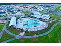 Aerial view of the community pool with a lazy river, clubhouse, and surrounding residences at 211 Clearpath Dr, Summerville, SC 29486