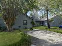 Attractive home exteriors with driveways, green lawns, trees, and easy parking access at 2196 Spoleto Ln, North Charleston, SC 29406