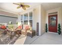 Inviting front porch featuring comfortable seating and a warm, welcoming atmosphere at 3005 Aura Ln, Summerville, SC 29483