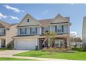 Charming two-story home featuring beautiful architecture and a well-maintained front lawn at 400 Dunlin Dr, Summerville, SC 29486